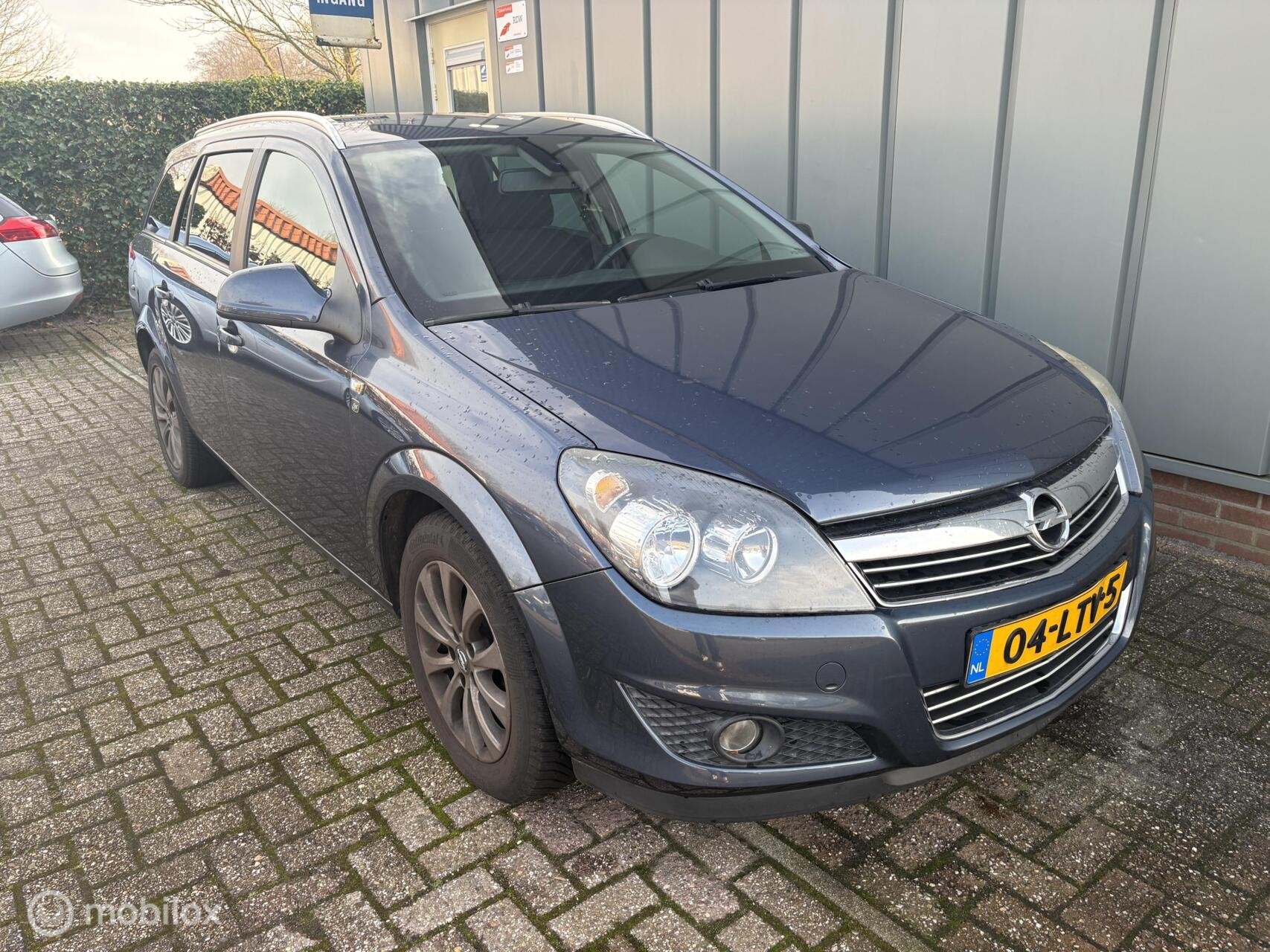 Opel Astra Wagon 1.6 111 years Edition - APK - NAP - Cruise, Voorwielaandrijving, Gebruikt, Zwart, Blauw