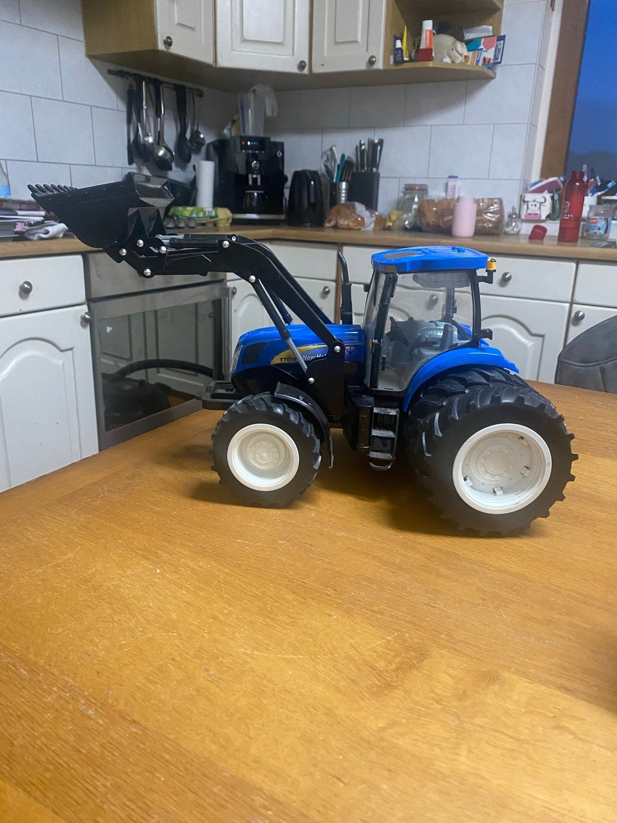 Blauwe speelgoedtractor met voorlader, Ophalen of Verzenden, Gebruikt