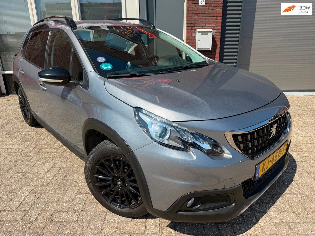 Peugeot 2008 1.2 PureTech GT-line / Leder / PDC / Navi / Cru, Auto's, Peugeot, Voorwielaandrijving, Met garantie (alle), Leder en Stof