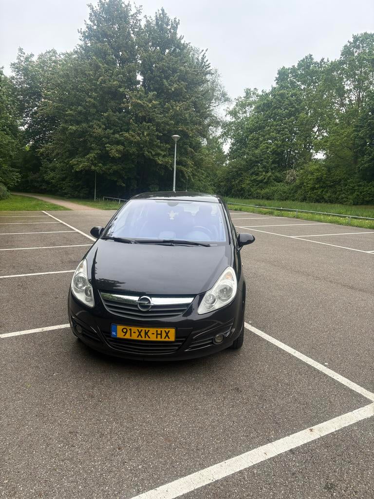 Opel Corsa 1.4 16V 5D 2007 Zwart, Auto's, Opel, Particulier, Corsa, Airbags, Airconditioning, Boordcomputer, Centrale vergrendeling