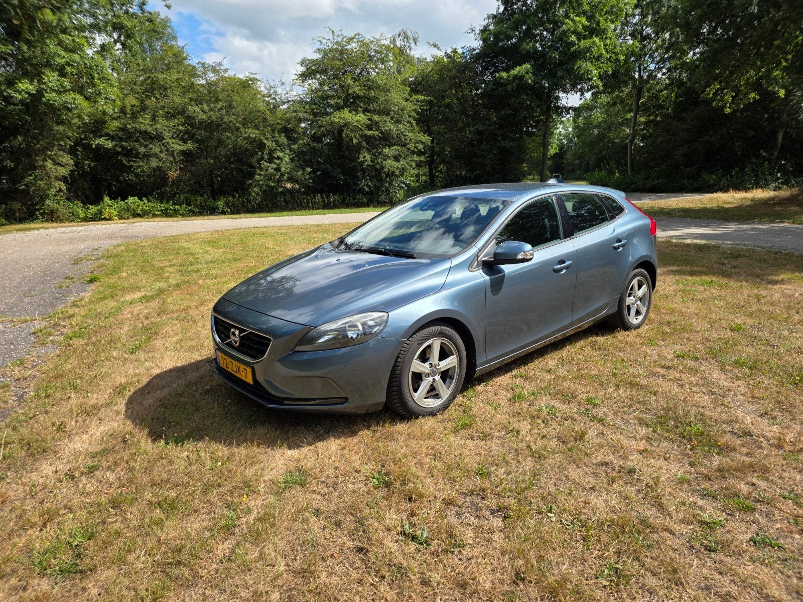 Volvo V40 1.6 D2 115PK 2012 Blauw, Auto's, Voorwielaandrijving, 28 km/l, 4 cilinders, Leder en Stof