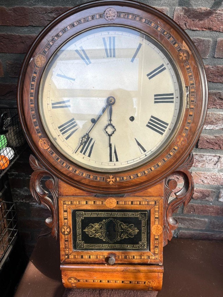 engelse pubklok drop dial, Ophalen
