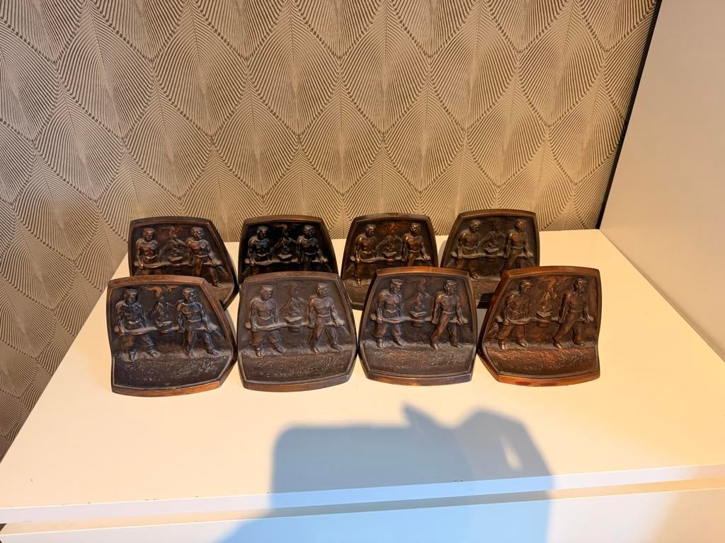 Set van 8 bronzen boekensteunen van ambachtslieden, Antiek en Kunst, Ophalen of Verzenden