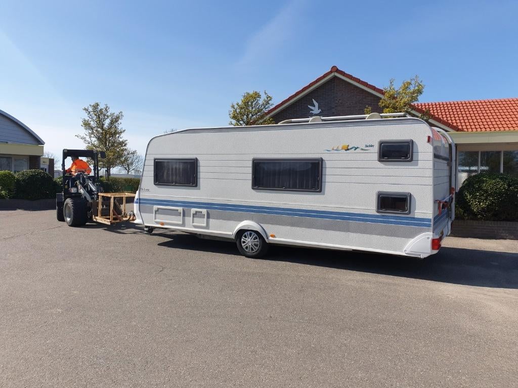 Complete gezinscaravan - Hobby 560KMfe De Luxe, Caravans en Kamperen, Hobby, Treinzit, Particulier, Kachel