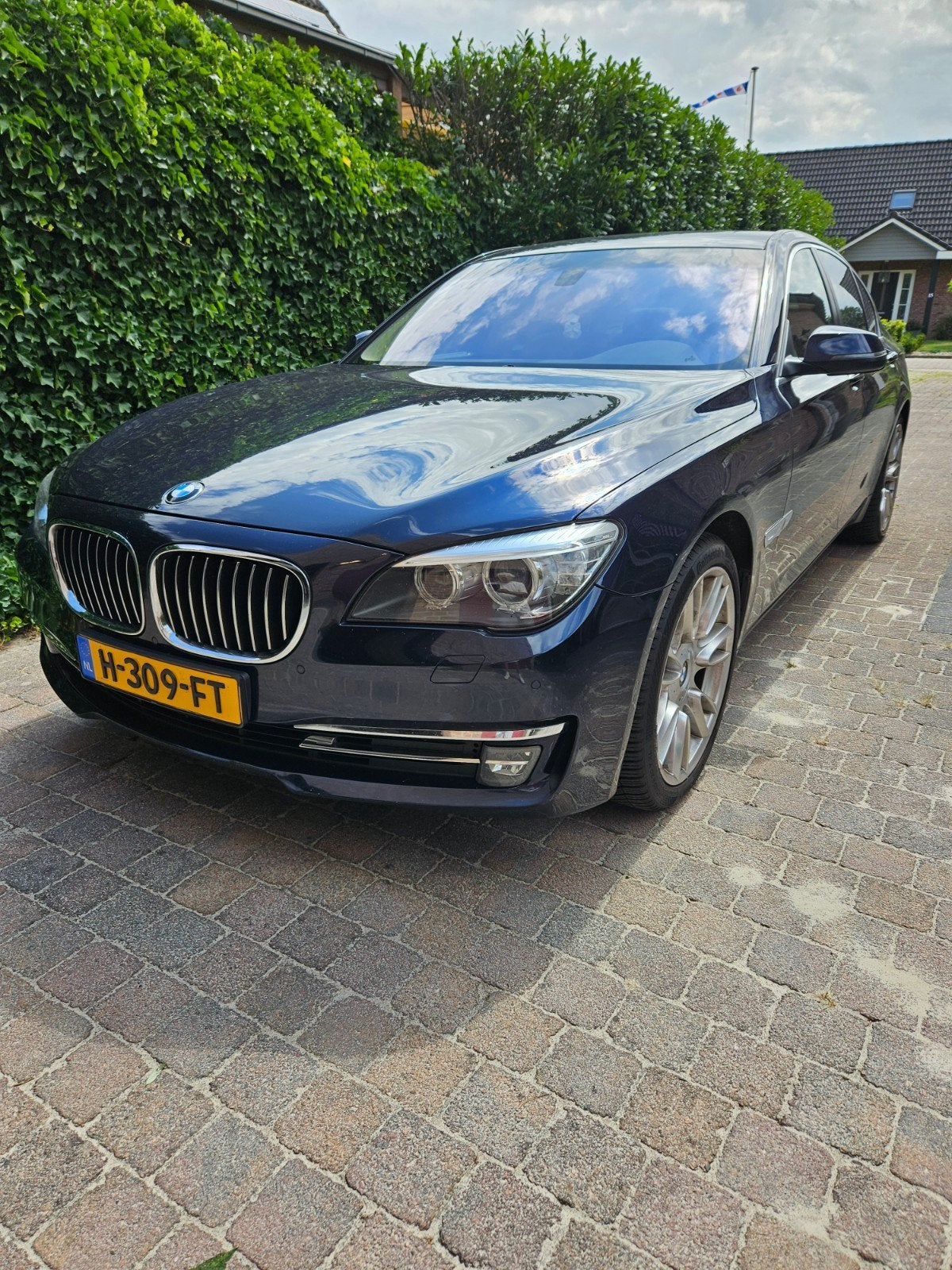 BMW 7-Serie 740i 320pk Aut 2014 Blauw, Auto's, Beige, Leder, Particulier, Sedan