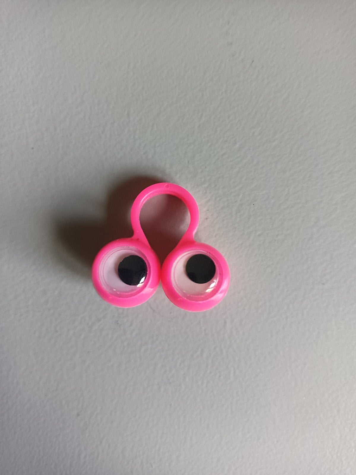 Roze vingerhouder vinger houder met oogjes, Ophalen of Verzenden, Zo goed als nieuw