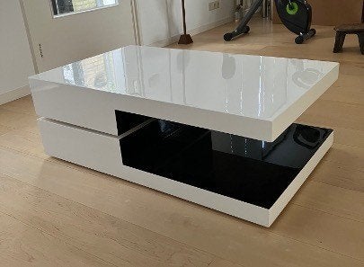 Draaibare salontafel in wit/zwart hoogglans