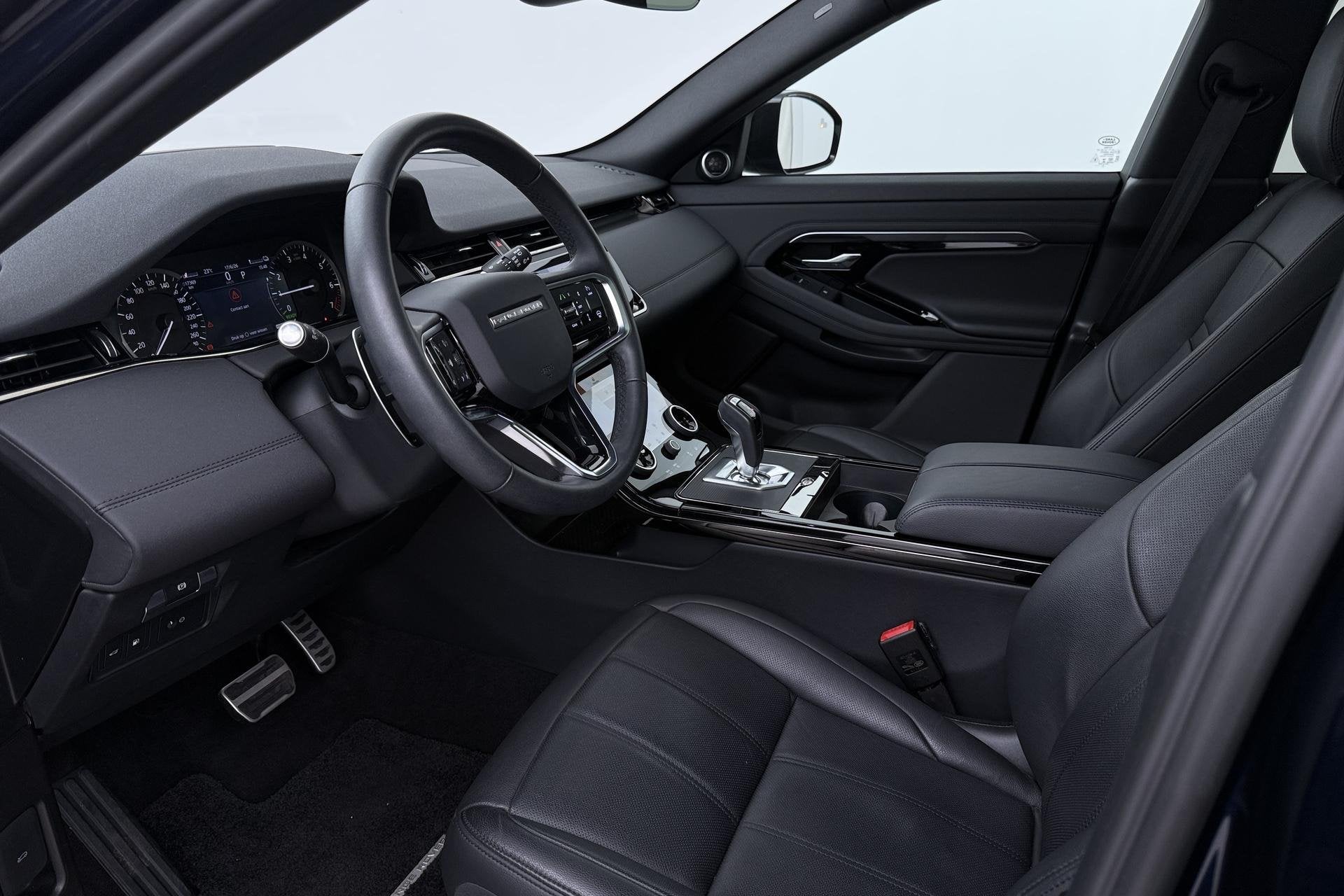 Land Rover Range Rover Evoque 1.5 P300e AWD R-Dynamic HSE |, Auto's, Land Rover, Automaat, 309 pk, Stof, Plug-in hybride