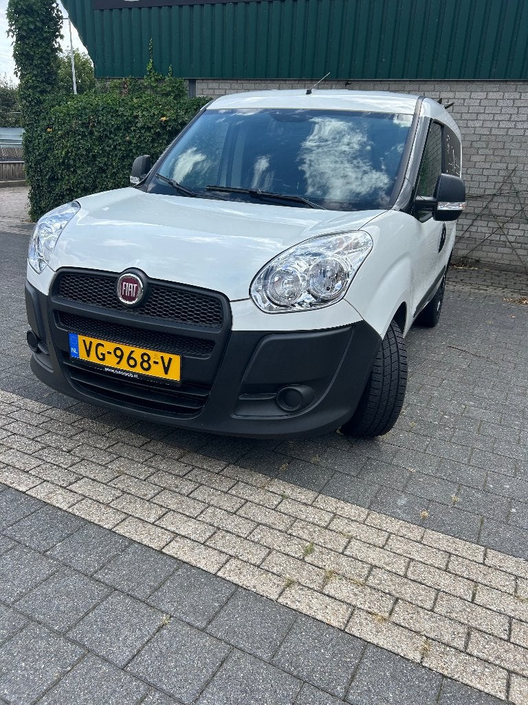Fiat Doblo C 1.2 2014, Auto's, Euro 5, Stof, Zwart, 4 cilinders