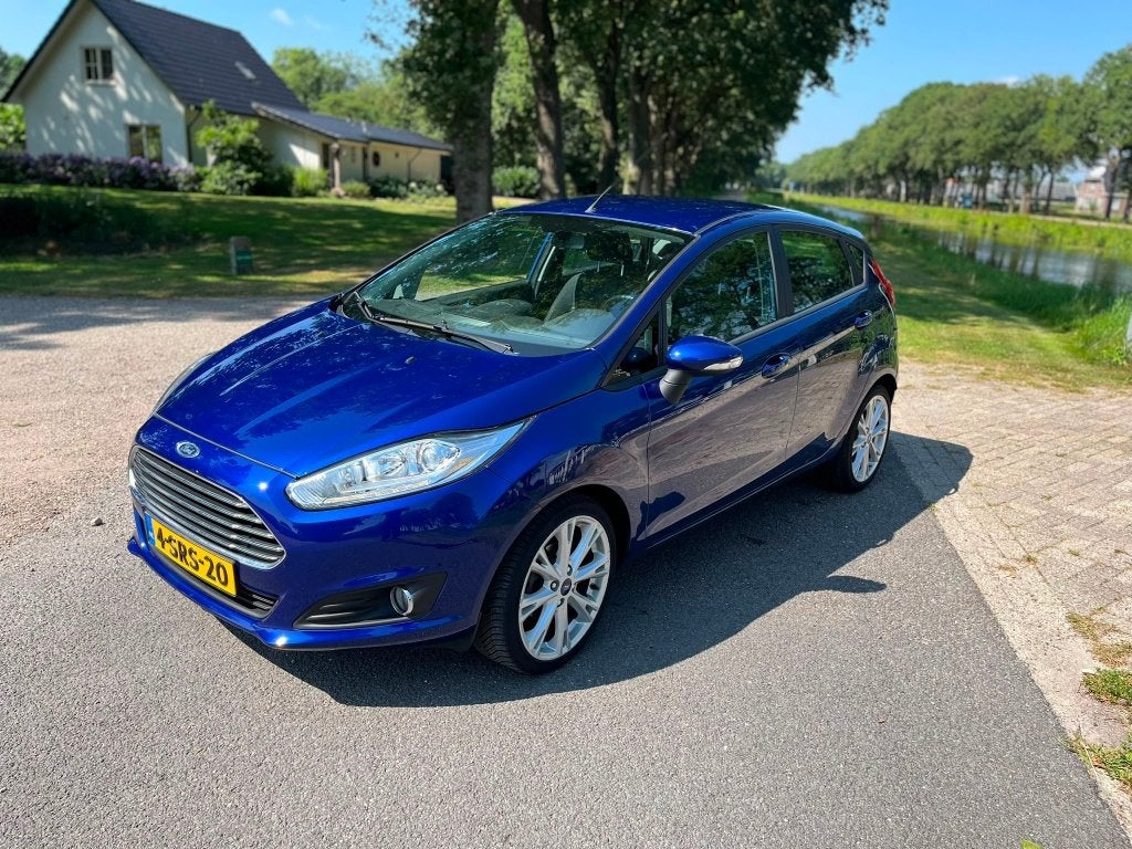 Ford Fiësta Style 1.0 59KW/80PK 5D 2013 Blauw, Voorwielaandrijving, Stof, 40 €/maand, Zwart