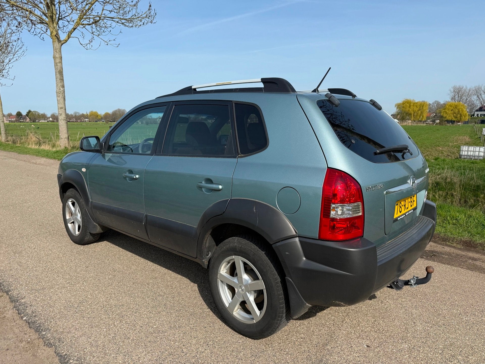 Hyundai Tucson 2.0i Dynamic Airco/Trekhaak, Auto's, Stof, Gebruikt, 4 cilinders, Origineel Nederlands
