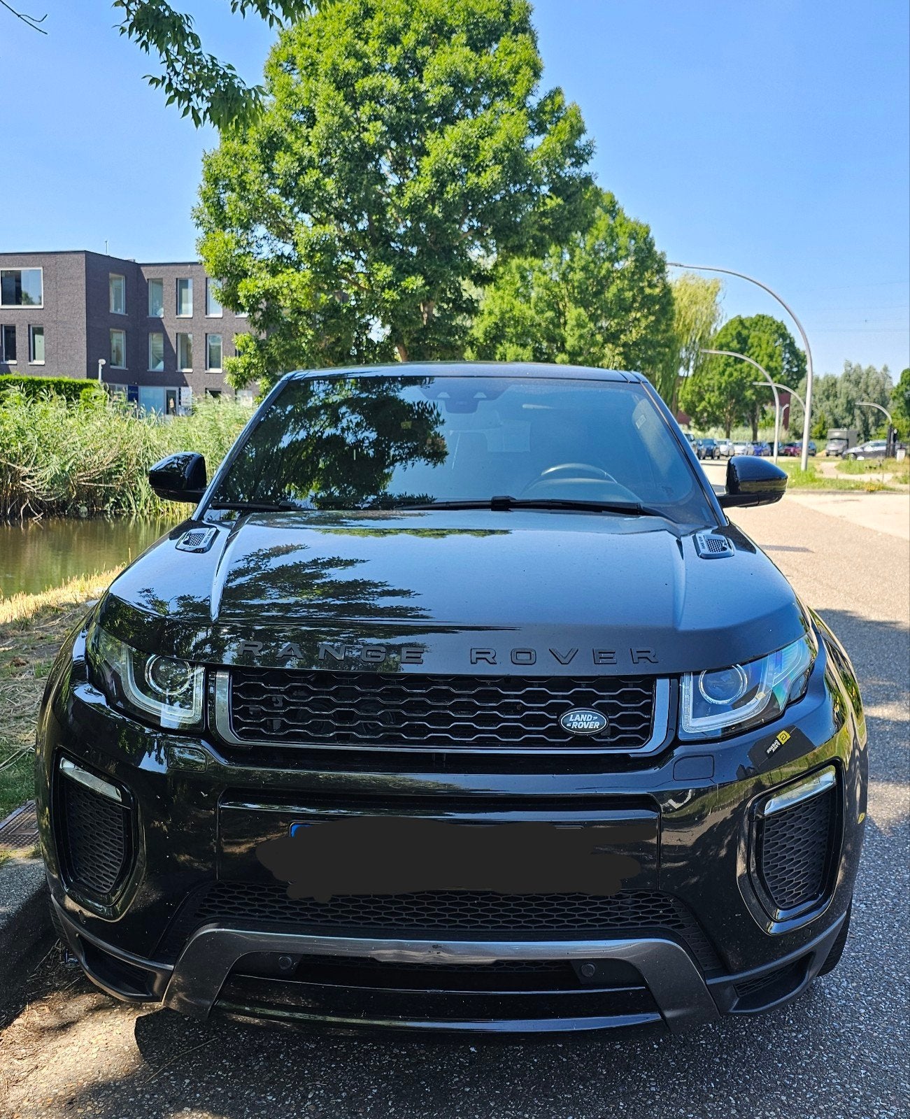 Land Rover Range Rover Evoque 2.0 TD4 150pk 4WD Aut 2017, Auto's, Automaat, 2000 kg, Zwart, Leder