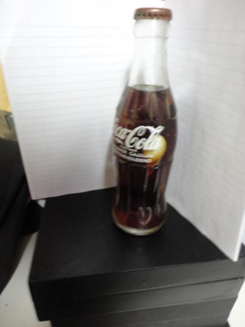flesje coca cola met lepeltje erin, Ophalen of Verzenden