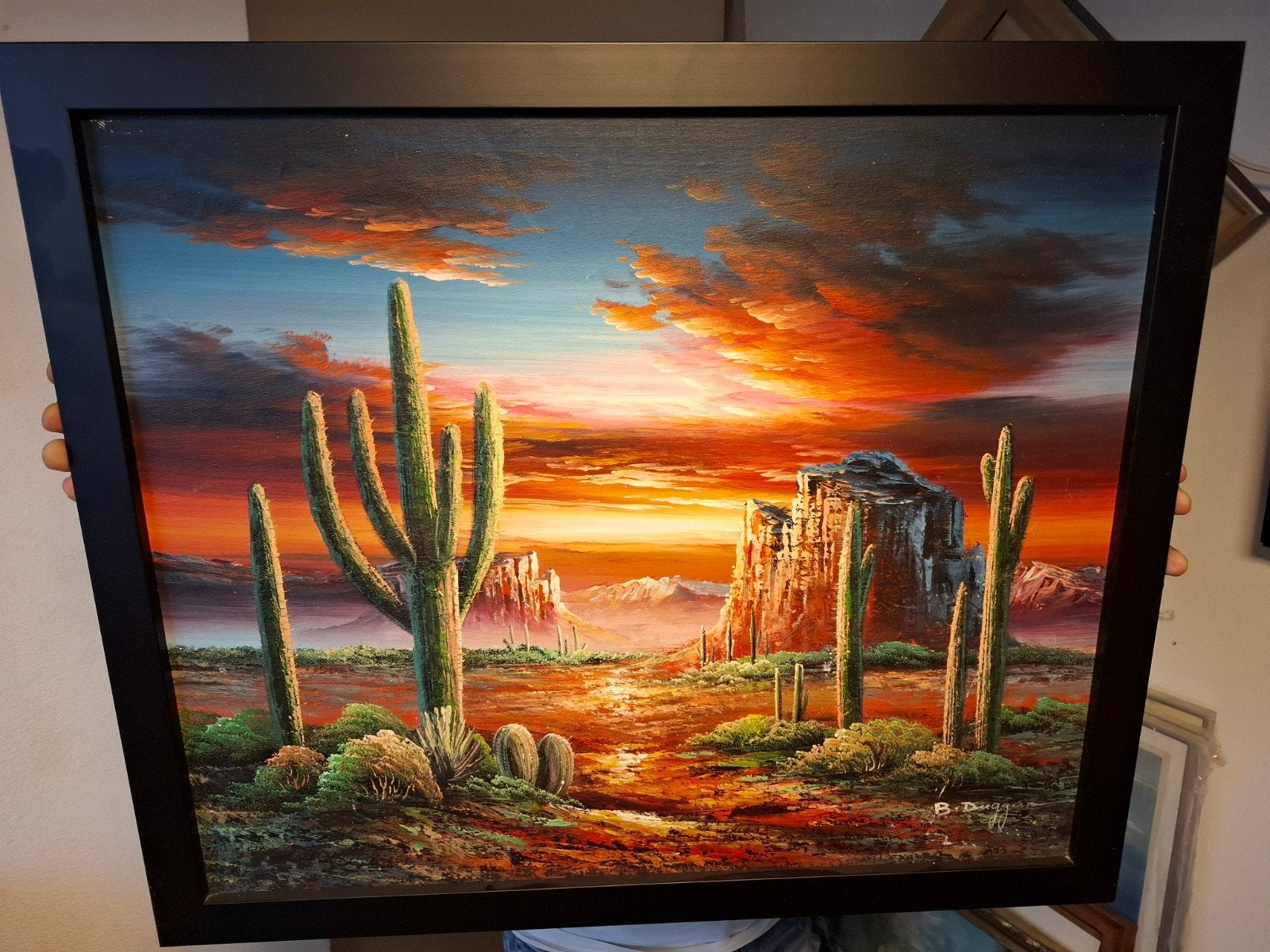 Schilderij B. Duggan - Woestijnlandschap met cactussen, Ophalen