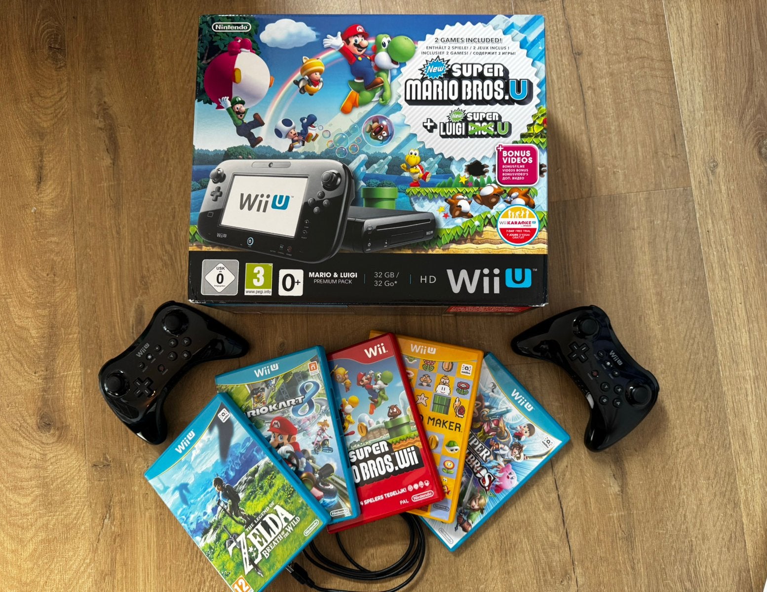 Wii U Mario & Luigi Premium + 2 Pro Controllers + 7 games, Ophalen of Verzenden, Gebruikt, Met 2 controllers, Met games
