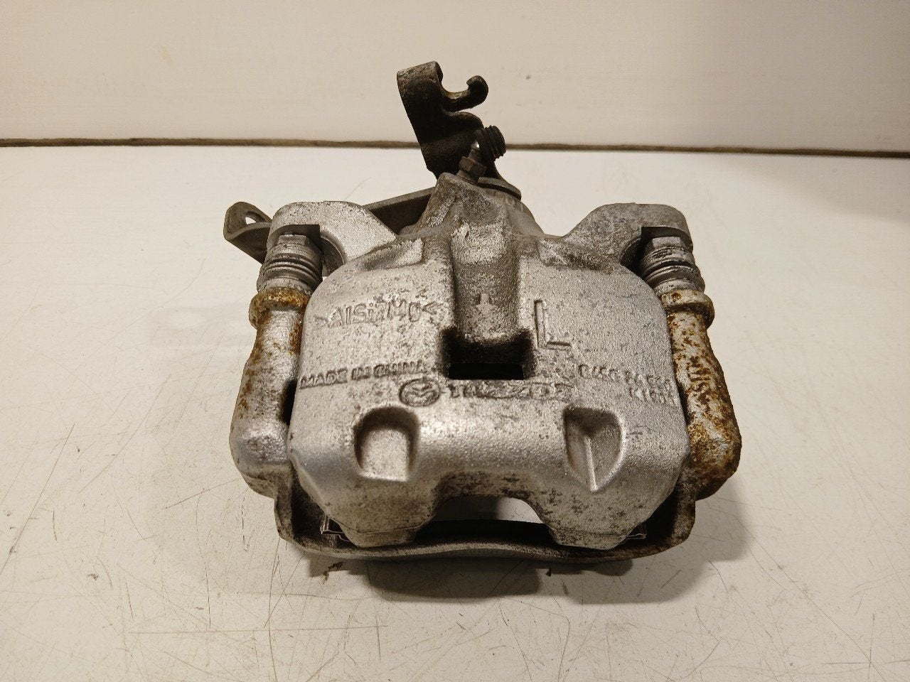 Remklauw links achter Mazda 3 serie, Onderdelen@venauto.nl, Van der Ven Autorecycling B.V., Gebruikt, Ettenseweg 76, 4706 PB Roosendaal, The Netherlands