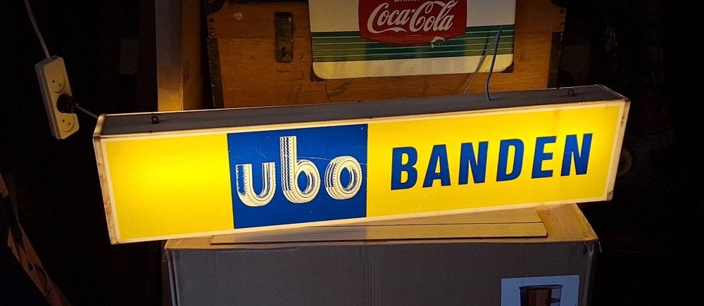 Mooie vintage reclamelichtbak van UBO banden., Ophalen, Gebruikt, ., Lichtbak of (neon) lamp