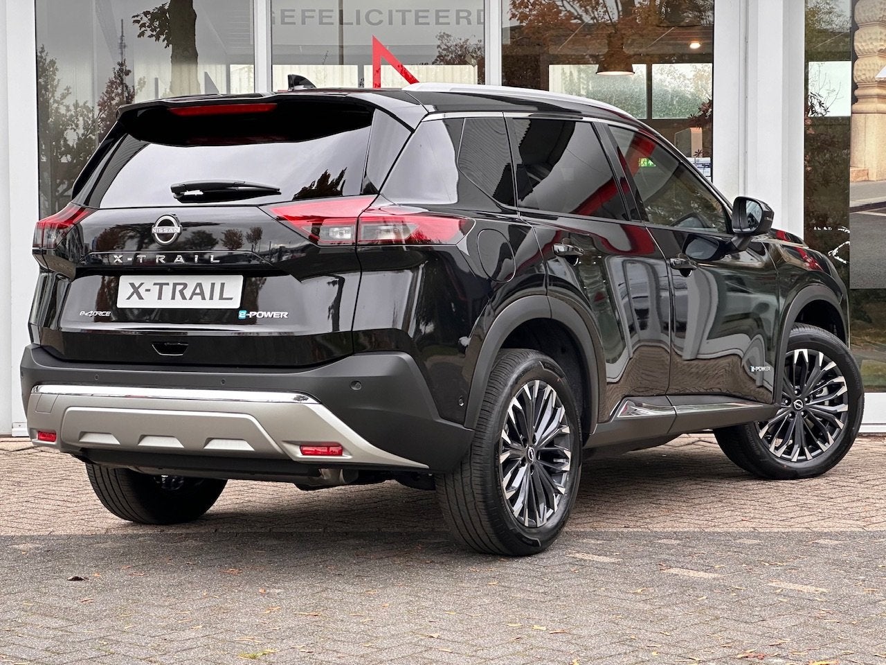 Nissan X-Trail E-Force 4WD Tekna 7-Persoons | Trekgewicht 1., Auto's, Nissan, 12 maanden, 1497 cc, Gebruikt, Zwart