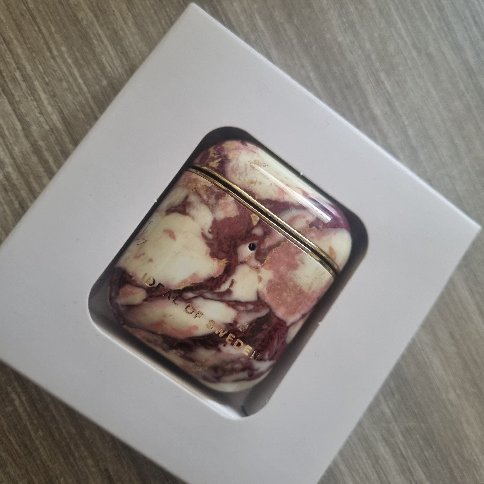 Nieuwe Ideal of Sweden AirPod Houder - Calcatta Ruby Marble, Ophalen of Verzenden, Nieuw, Bescherming