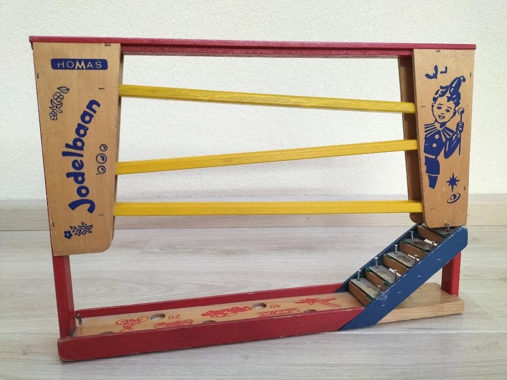 Mooie vintage oude Jodelbaan knikkerbaan van merk Homas, Antiek en Kunst, Antiek | Speelgoed, Ophalen of Verzenden