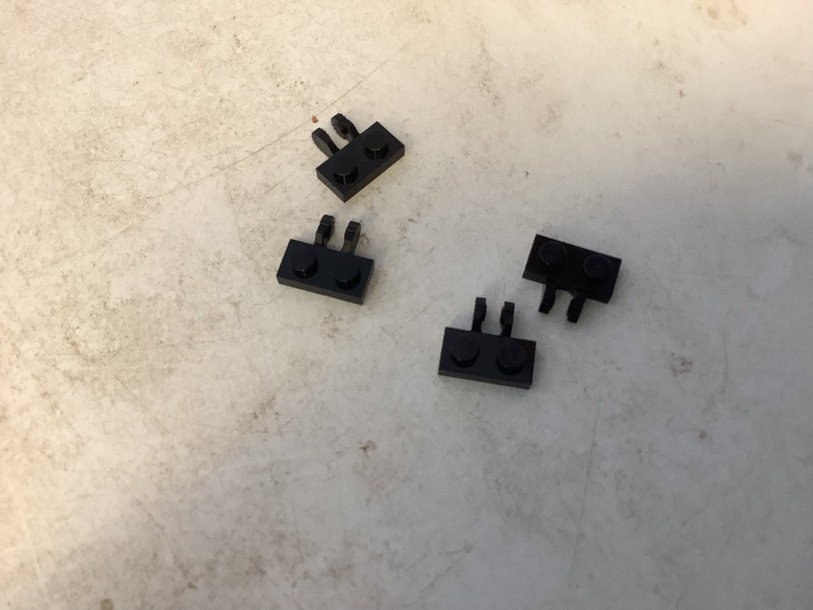 Lego scharnierplaat 1x2 met 2 vingers aan zijkant zwart, Ophalen of Verzenden, Gebruikt, Losse stenen, Lego