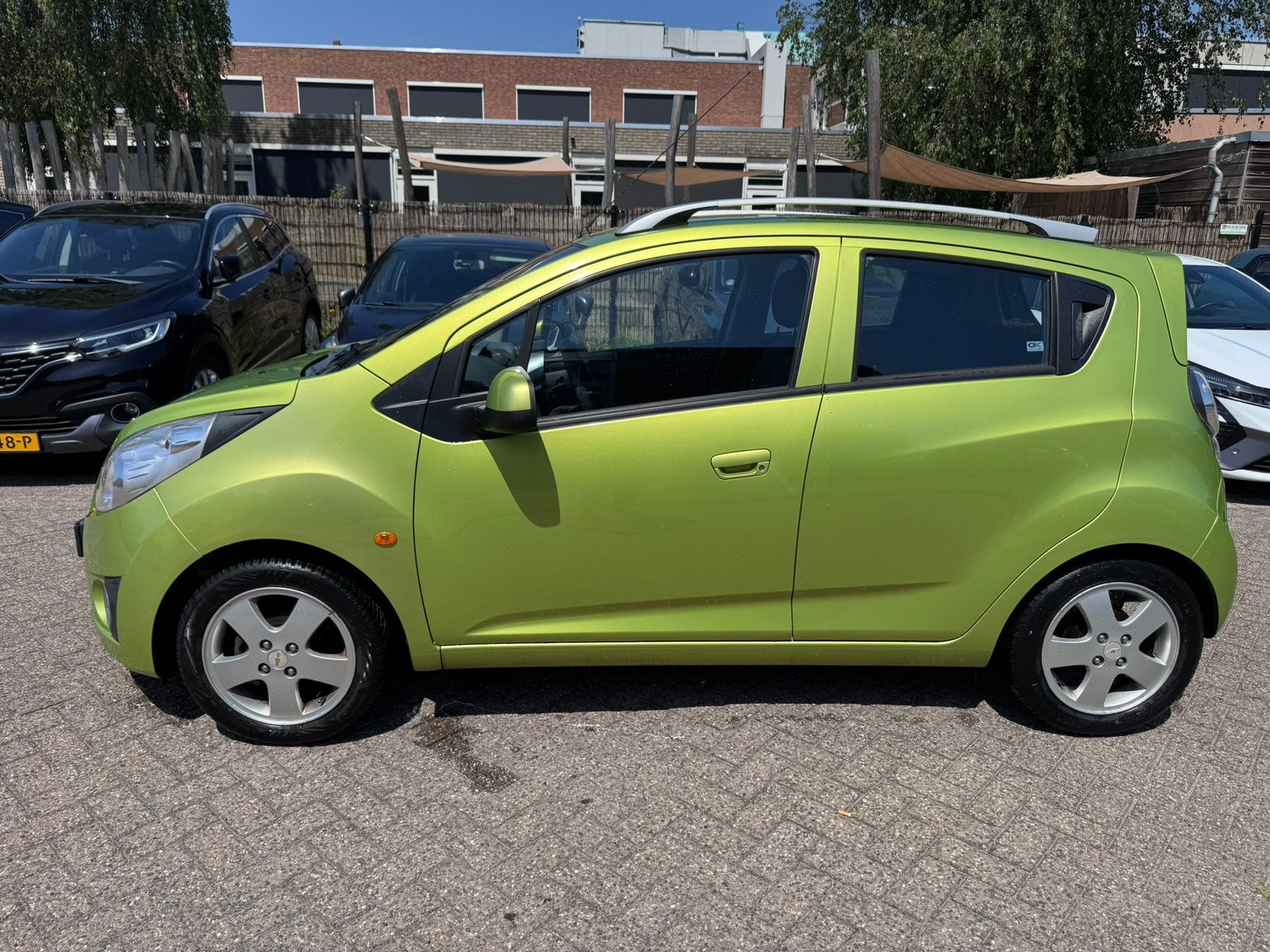 Chevrolet Spark 1.0 Bifuel 2010 Groen, Auto's, Euro 5, 37 €/maand, 4 cilinders, Origineel Nederlands