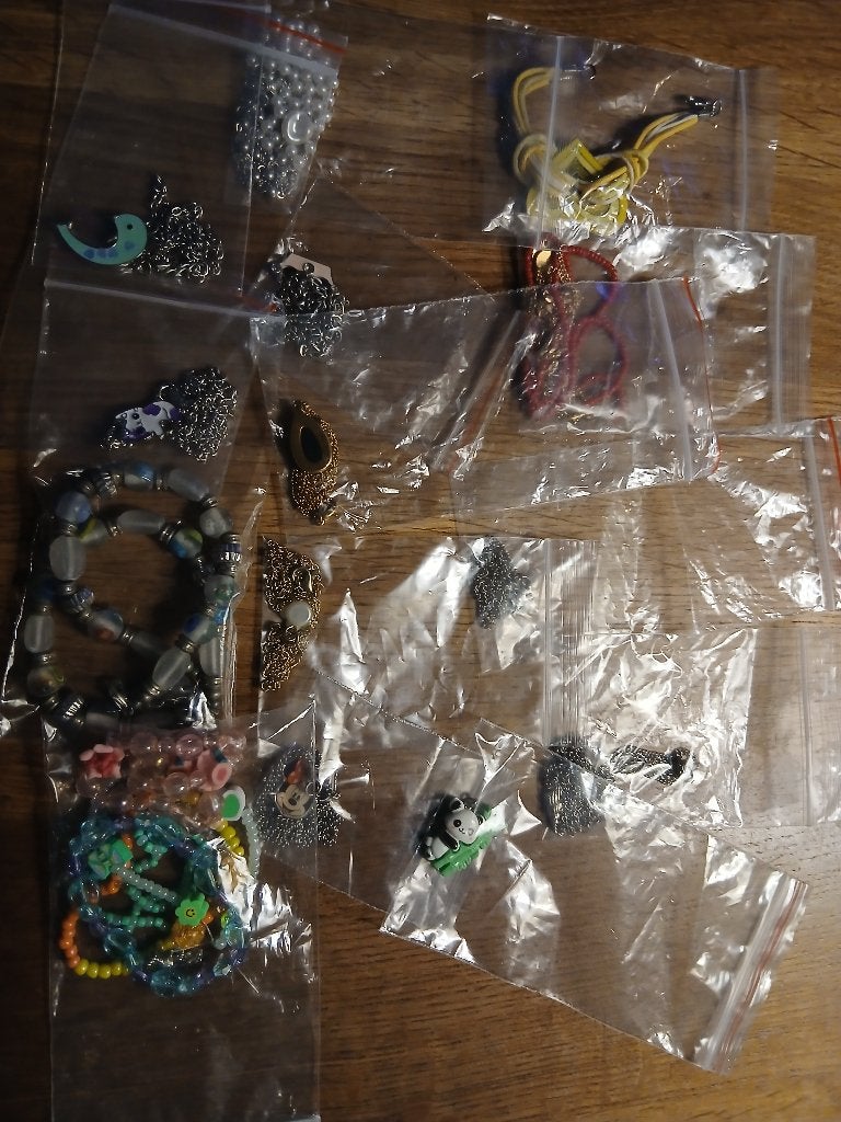 Sieraden kinderen en dames, Ophalen of Verzenden, Gebruikt, Overige kleuren, Overige materialen