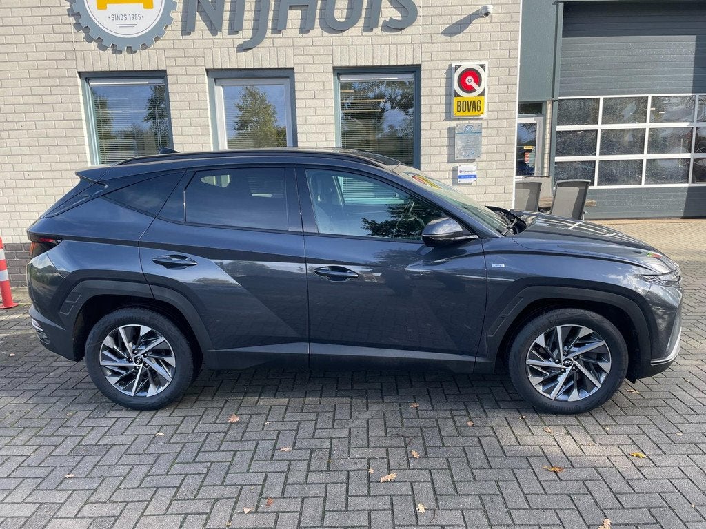 Hyundai TUCSON 1.6 T-GDI MHEV i-Motion / Automaat / Camera /, Auto's, Hyundai, Stof, Gebruikt, 4 cilinders, 150 pk