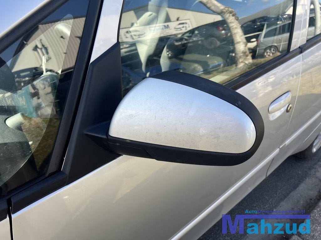 Mitsubishi colt 6 grijs 16H spiegel links 2004-2014, Info@mitsubishi-motors.com, Gebruikt, Mitsubishi Motors Corporation, Ophalen of Verzenden