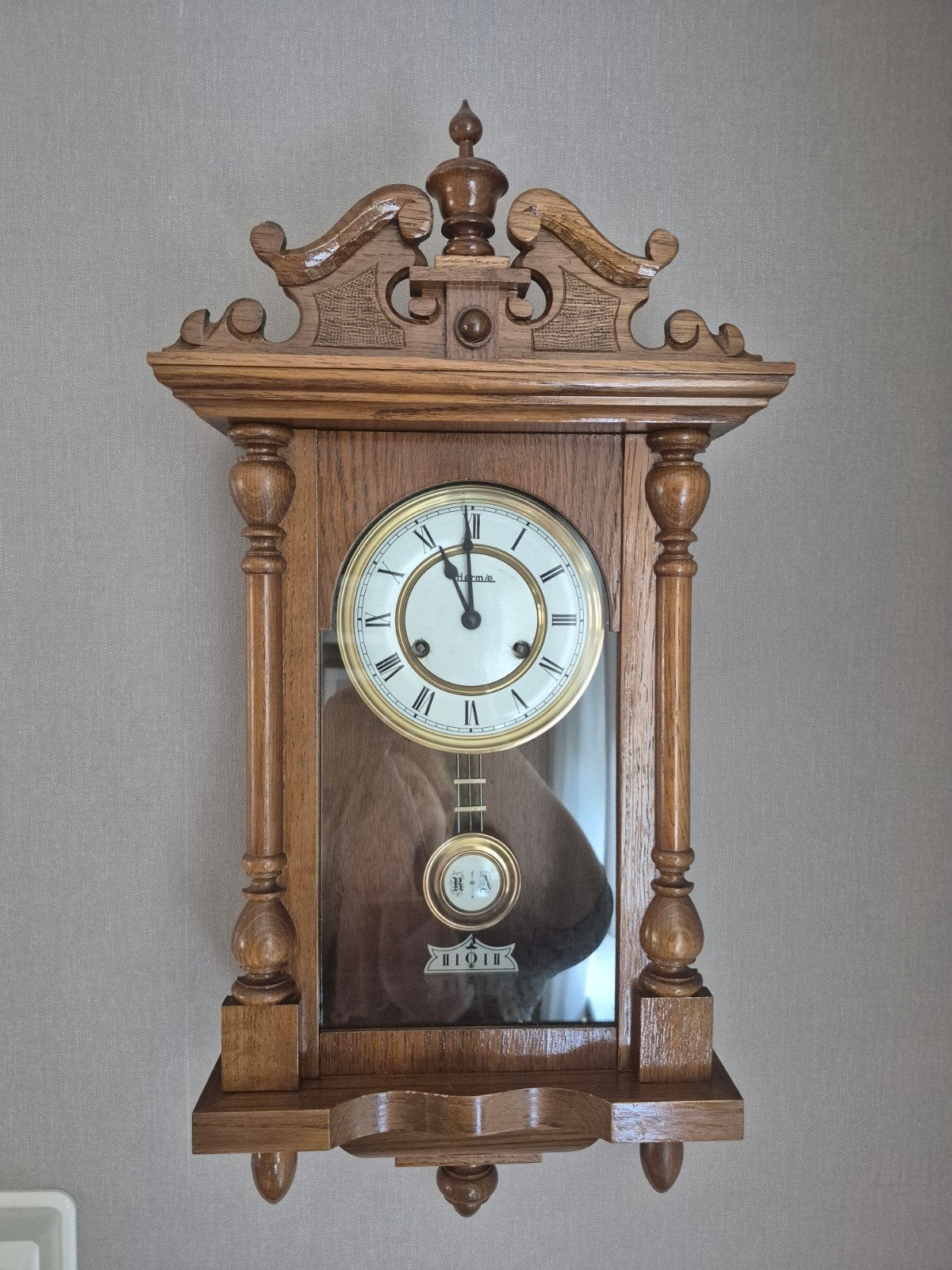 Hermle wandklok met slinger, Ophalen