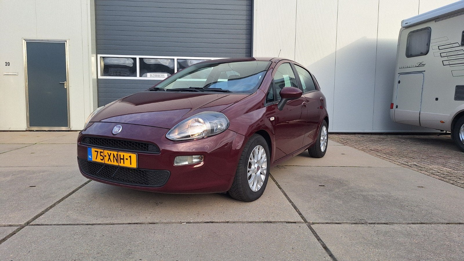 Fiat Punto 1.3 Multijet 62KW 5DR 2012 Rood, Auto's, Voorwielaandrijving, 4 cilinders, 400 kg, Origineel Nederlands