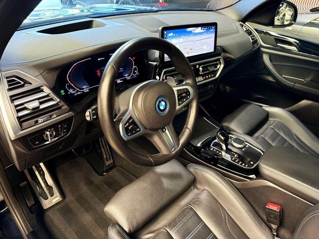 BMW X3 xDrive30e M-sport M-seats Pano Tr.hk 21 inch, 1998 cc, Gebruikt, 4 cilinders, Leder en Stof