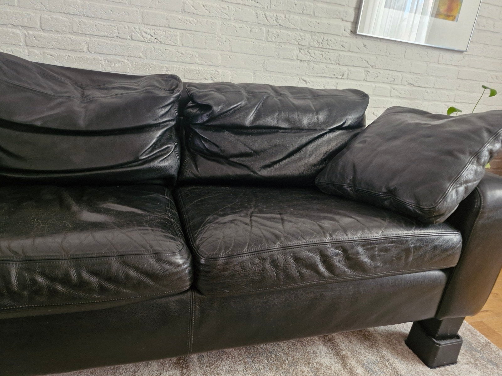 Zwarte leren tweepersoonsbank - Gebruikt, Huis en Inrichting, Ophalen, Modern, Comfortabel, Gebruikt, 150 tot 200 cm