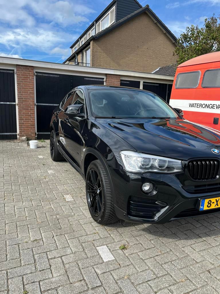 BMW X4 2.0 Xdrive 20I AUT 2014 Zwart, Auto's, Zwart, 4 cilinders, 2000 kg, Leder en Stof