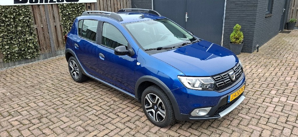 Dacia Sandero 1.0 TCe Bi-Fuel Stepway Serie Limitee 15th Ann, Auto's, Dacia, Bedrijf, Te koop, Sandero Stepway, ABS, Achteruitrijcamera