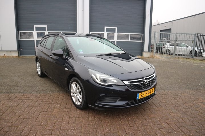 Opel Astra Sports Tourer 1.4 Business+ 1e EIGENAAR, Stof, Gebruikt, 4 cilinders, 150 pk