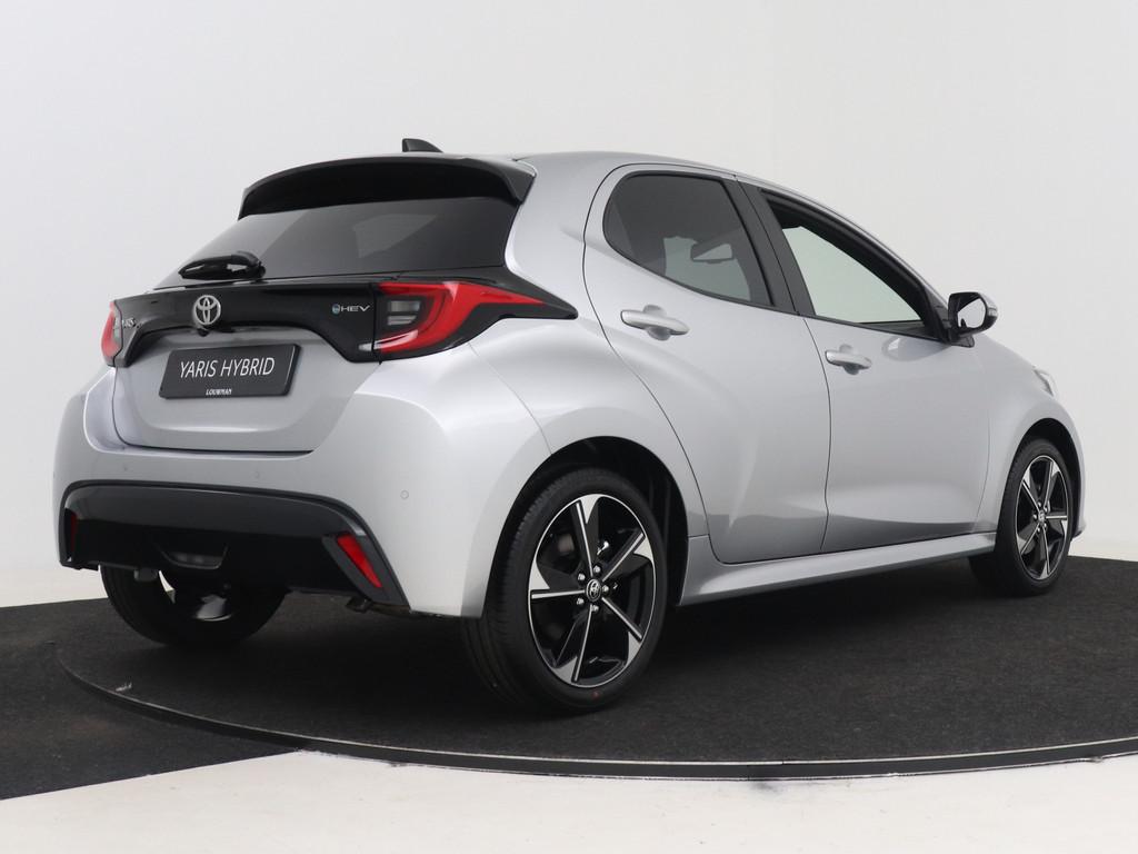 Toyota Yaris 1.5 Hybrid 115 Dynamic | NIEUW & DIRECT LEVERBA, Auto's, Toyota, 12 maanden, Stof, Zwart, Automatische klimaatregeling