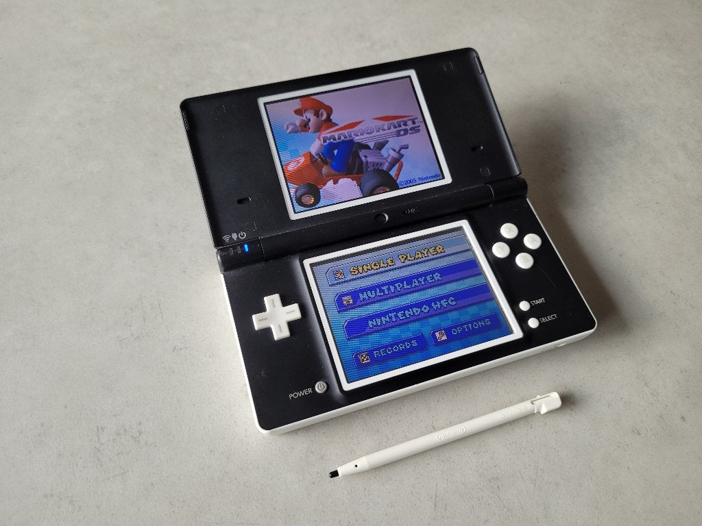 Nintendo DSI met Spellen, Spelcomputers en Games, Spelcomputers | Nintendo DS, Zwart, Dsi, Ophalen of Verzenden, Gebruikt