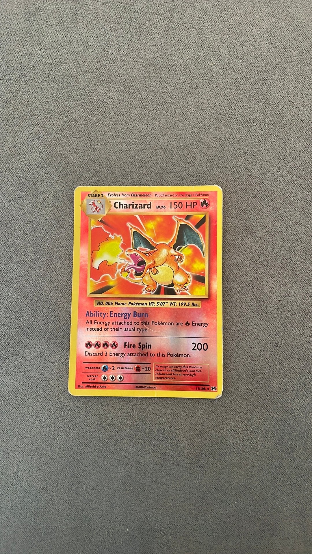 Charizard Evolutions #11, Ophalen of Verzenden, Zo goed als nieuw