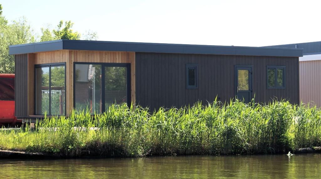Nieuwe chalet 48m2 Luxe keuken, 2 slaapkamers, Gasloos, Tot en met 6
