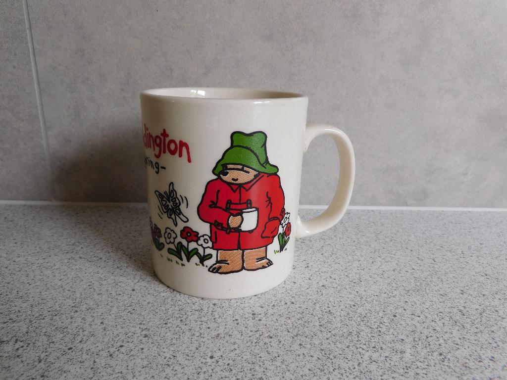 Mok 9x8 cm. Paddington Spring Douwe Egberts, Ophalen of Verzenden, Zo goed als nieuw, Overige stijlen, Kop(pen) en/of Schotel(s)