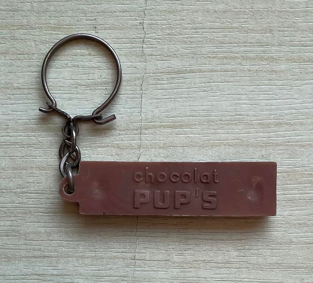 Vintage sleutelhanger chocolat PUP’S, Ophalen of Verzenden, Gebruikt, Merk