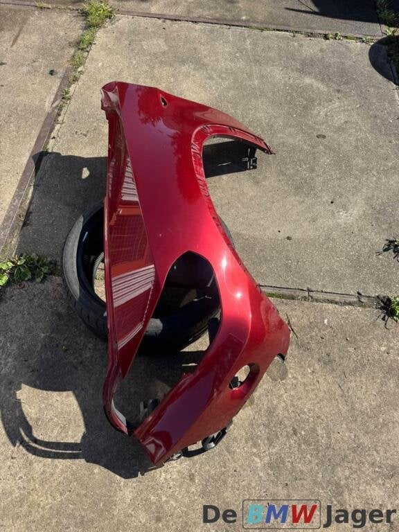 Linker spatbord vermilion rot A82 BMW X5 E70 51127157979, Gebruikt, Ophalen of Verzenden, BMW