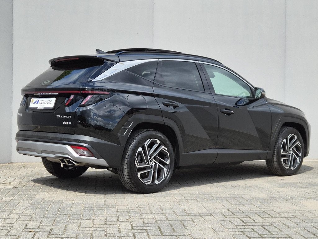 Hyundai Tucson 1.6 T-GDI PHEV Premium Sky / Fabrieksgarantie, Auto's, Hyundai, 14 kWh, Gebruikt, Euro 6, 4 cilinders
