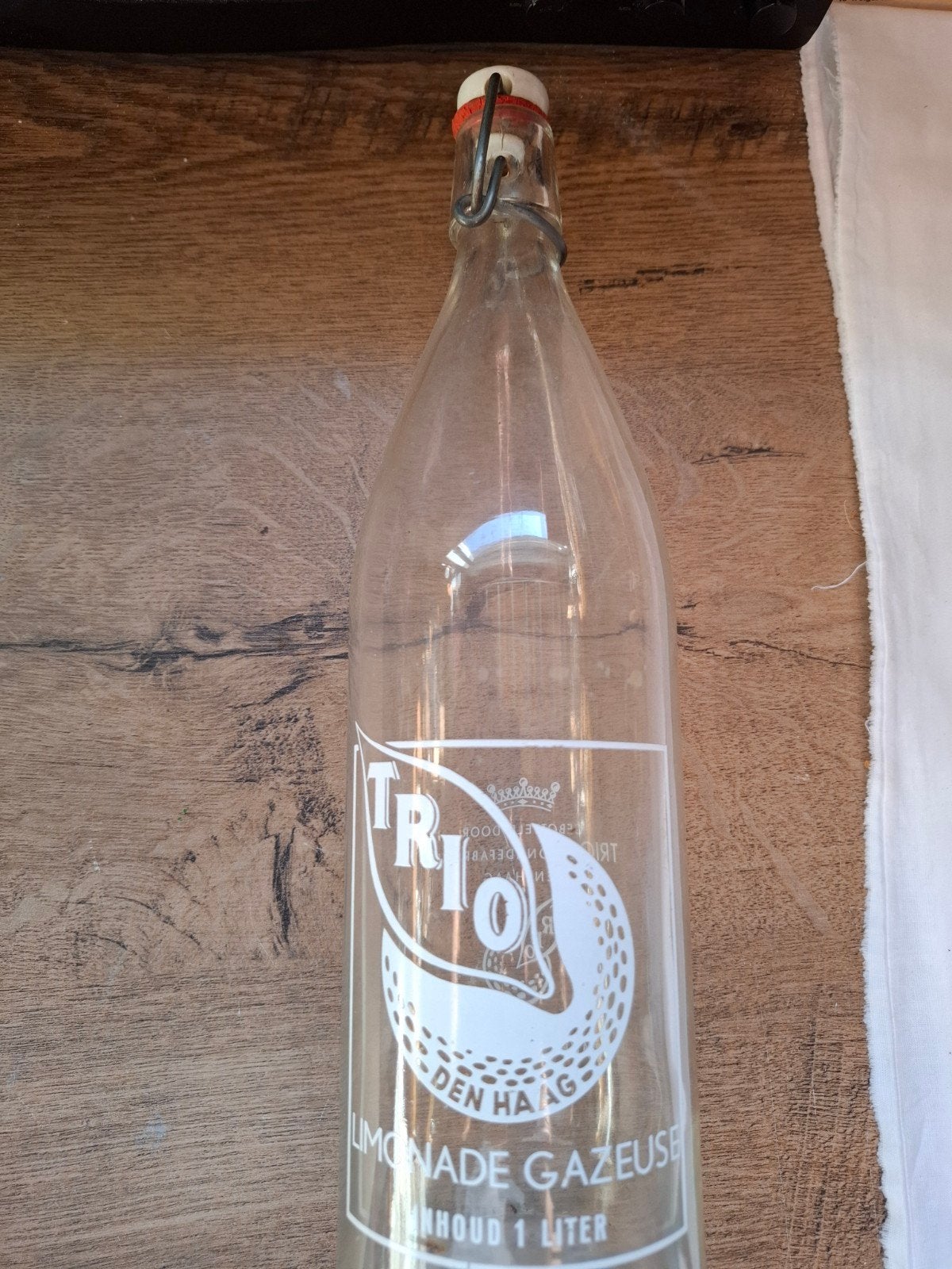 Mooie beugelfles Trio limonade gazeuse uit Den Haag, Verzamelen, Ophalen of Verzenden, Zo goed als nieuw, Verpakking