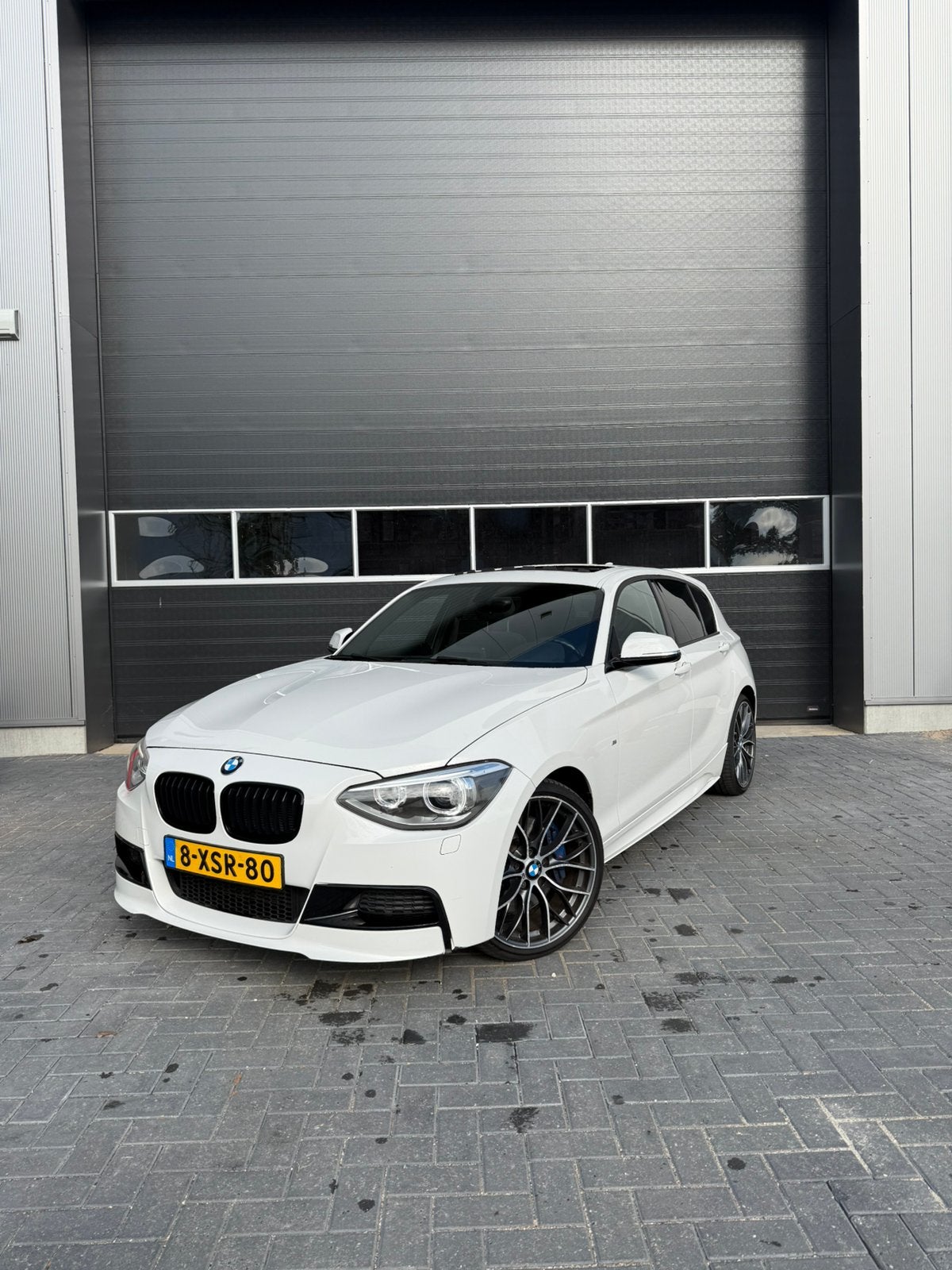 BMW 1-Serie 118I M-Pakket, Automaat, Panorama, LAGE KM-STAND, Achterwielaandrijving, 4 cilinders, Wit, Origineel Nederlands