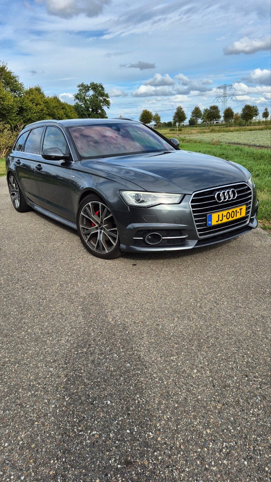 Audi A6 1.8 Tfsi Ultra AV S-tr 140KW 2016 Grijs, Auto's, 1610 kg, Zwart, Origineel Nederlands, Stationwagon