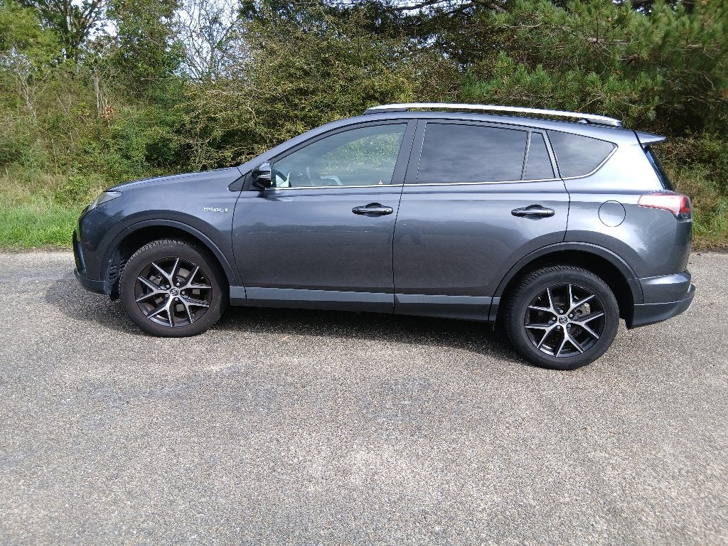 Toyota Rav4 2.5 Vvt-i Hybrid 155pk 2WD Aut 2017 Grijs, Auto's, Stof, 155 pk, Grijs, Rav4