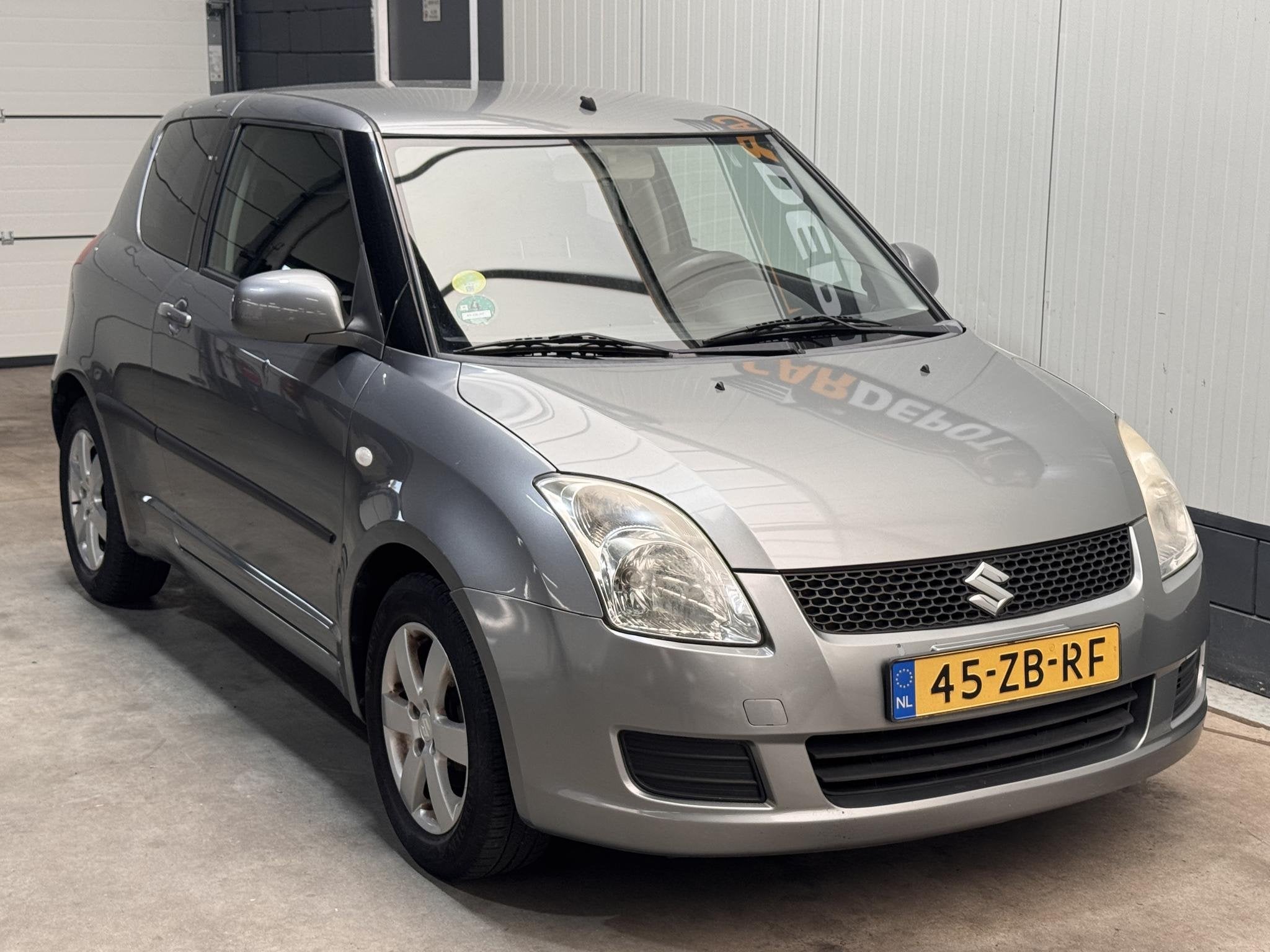 Suzuki Swift 1.3 Cool, Auto's, Stof, Gebruikt, 31 €/maand, Emergency brake assist