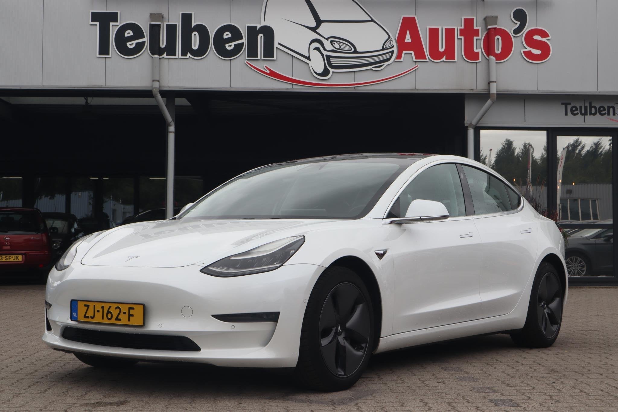 Tesla Model 3 Long Range AWD 75 kWh | SOH 84,6% | Full Self-, Auto's, Automaat, Stof, Electronic Stability Program (ESP), Wit